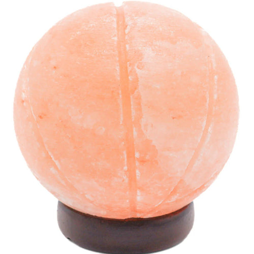 Hand-turned Himalayan salt sphere lamp glowing warm