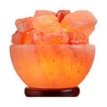 Large carved salt bowl heaped with glowing salt chunks