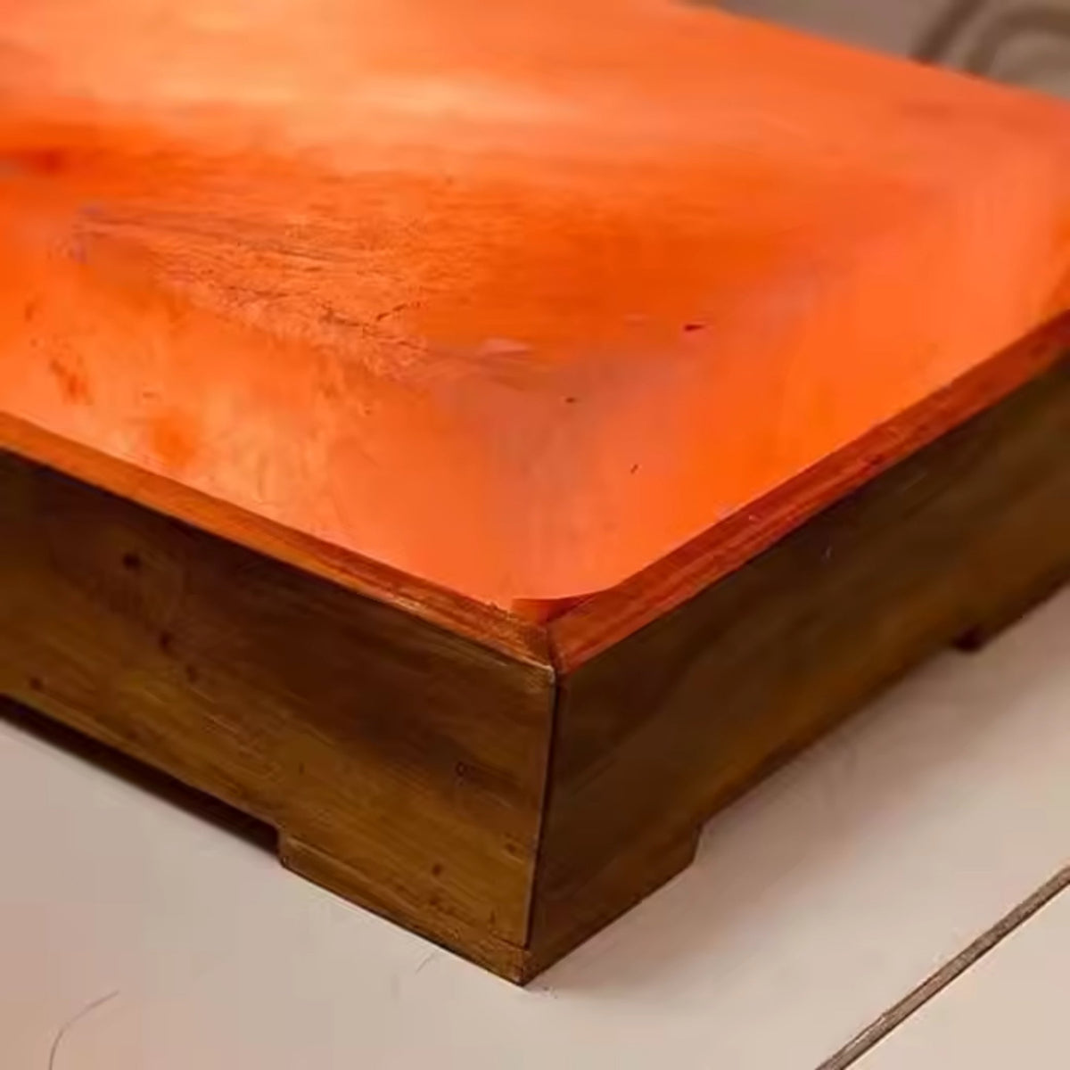 Pair of warming Himalayan salt foot tiles glowing warm