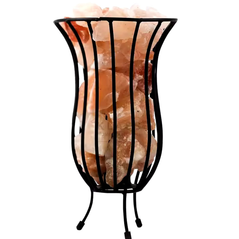 Tall jar-shaped metal basket of glowing salt chunks