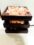 Wooden basket Himalayan salt lamp filled with glowing salt chunks