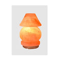 Himalayan salt table lamp glowing warm